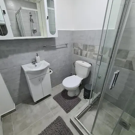 Grey & Sunny Апартаменты